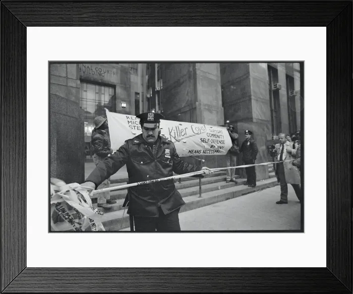 Framed Print : Police Officer Cordoning a Building Entrance Framed Print : Police Officer Cordoning a Building Entrance
