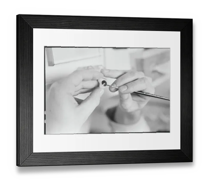 Framed Print : Worker Painting Artificial Eye Framed Print : Worker Painting Artificial Eye
