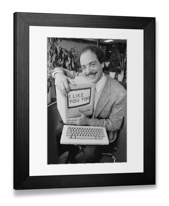 Framed Print : Man Cuddling Friendly Computer Framed Print : Man Cuddling Friendly Computer