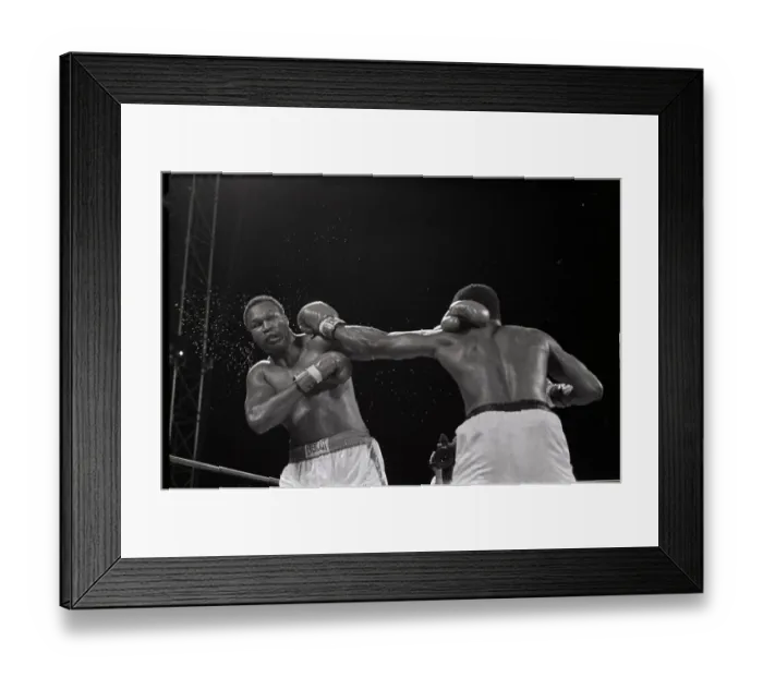 Framed Print : Michael Spinks Hits Larry Holmes In Ring Framed Print : Michael Spinks Hits Larry Holmes In Ring
