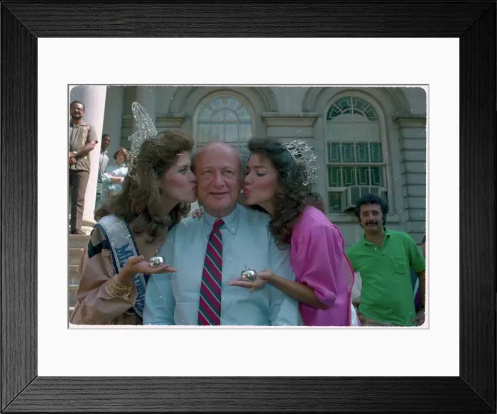 Framed Print : Miss USA and Miss Universe Kissing Mayor Edward Koch at Ceremony Framed Print : Miss USA and Miss Universe Kissing Mayor Edward Koch at Ceremony