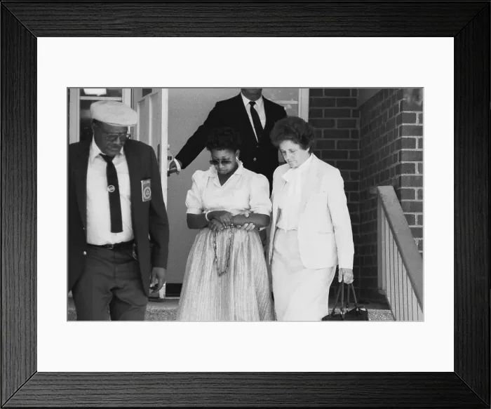 Framed Print : Sharon Scranage Being Escorted by Law Officials Framed Print : Sharon Scranage Being Escorted by Law Officials
