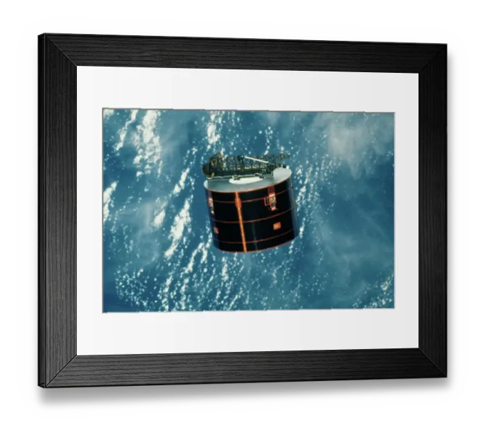 Framed Print : Discovery Satellite in Orbit