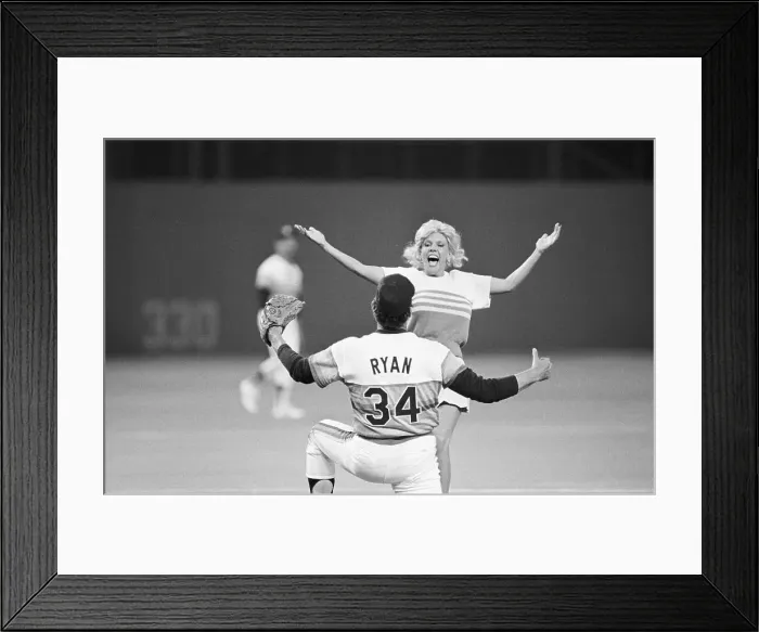Framed Print : Nolan Ryan About To Hug Woman On Field