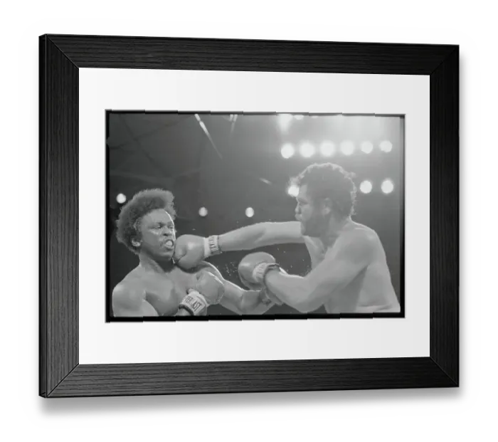 Framed Print : Tex Cobb Punching Michael Dokes Framed Print : Tex Cobb Punching Michael Dokes