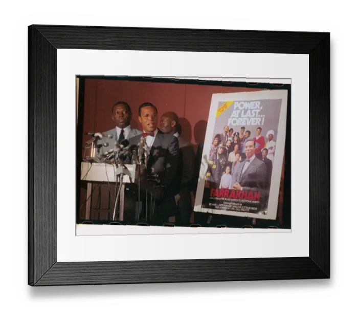Framed Print : Louis Farrakhan Standing at Podium with Poster Framed Print : Louis Farrakhan Standing at Podium with Poster