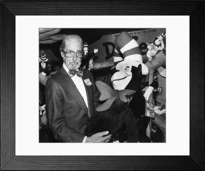Framed Print : Theodor Geisel Holds Cat in Hat Toy Framed Print : Theodor Geisel Holds Cat in Hat Toy