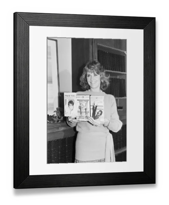 Framed Print : Jane Fonda Holding Workout Tapes Framed Print : Jane Fonda Holding Workout Tapes