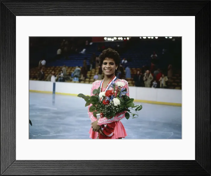 Framed Print : Portrait of Ice Skating Champion Debi Thomas with Bouquet Framed Print : Portrait of Ice Skating Champion Debi Thomas with Bouquet