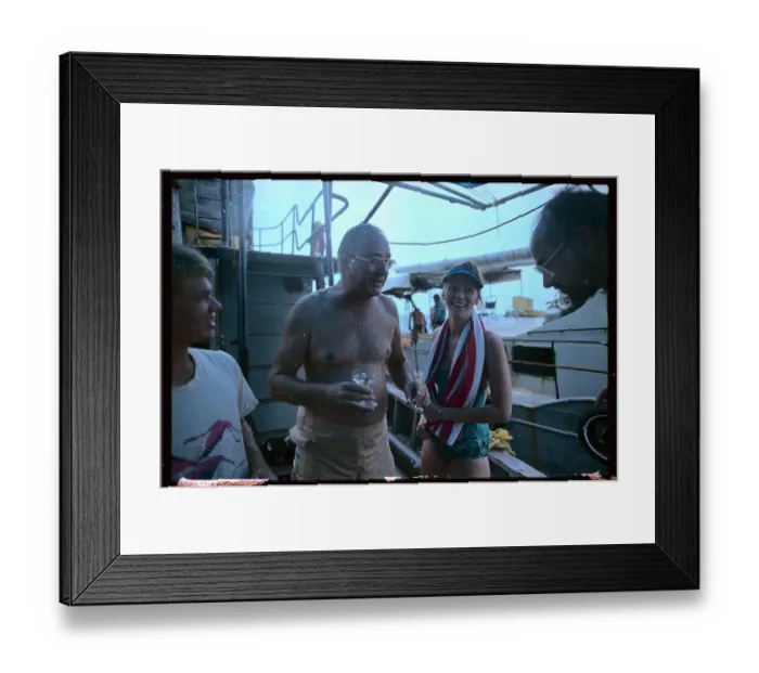 Framed Print : Meld Fisher Drinking Champagne on Boat Framed Print : Meld Fisher Drinking Champagne on Boat