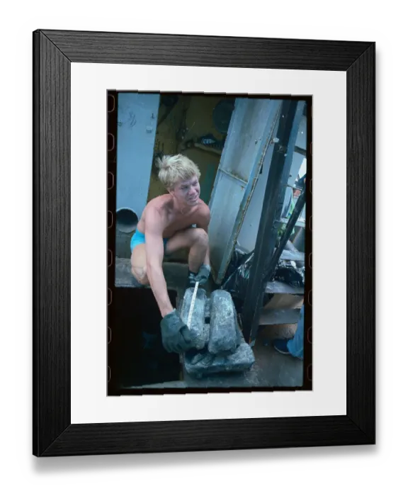 Framed Print : Man Measuring Silver Bars from Shipwreck Framed Print : Man Measuring Silver Bars from Shipwreck