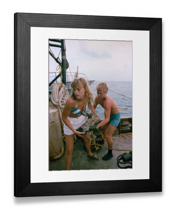 Framed Print : Piece of Ship Wreckage Being Loaded onto Boat Framed Print : Piece of Ship Wreckage Being Loaded onto Boat