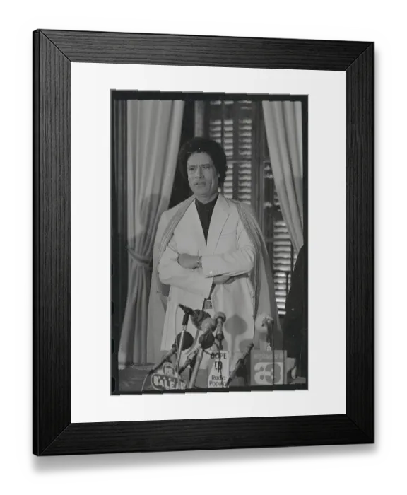Framed Print : Moammar Khadafy Standing with His Arms Folded Framed Print : Moammar Khadafy Standing with His Arms Folded