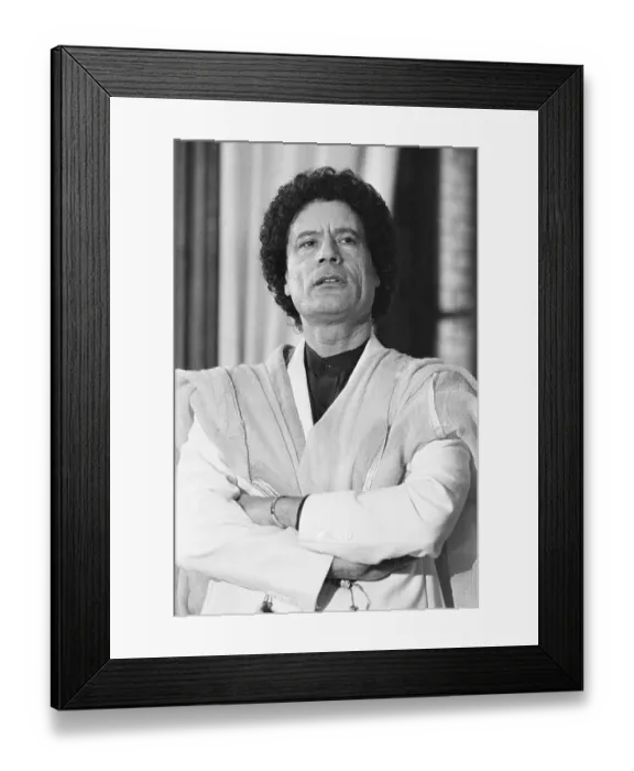 Framed Print : Moammar Khadafy Standing with His Arms Folded Framed Print : Moammar Khadafy Standing with His Arms Folded