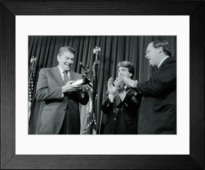 Framed Print : Ronald Reagan Holding Heisman Trophy Replica Framed Print : Ronald Reagan Holding Heisman Trophy Replica
