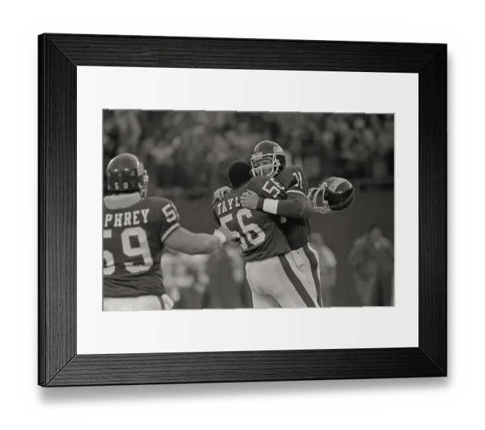 Framed Print : Phil Simms and Lawrence Taylor in a Winning Moment Framed Print : Phil Simms and Lawrence Taylor in a Winning Moment