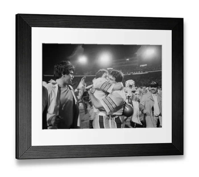 Framed Print : Doug Flutie Hugging Teammate Framed Print : Doug Flutie Hugging Teammate