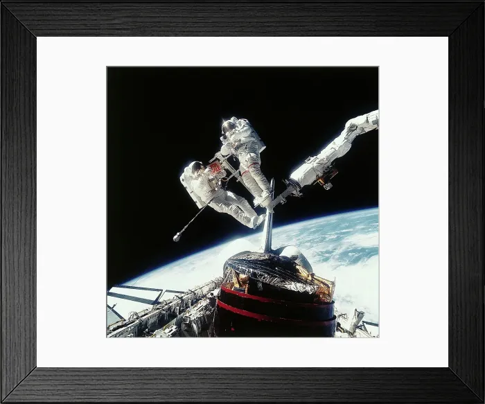 Framed Print : Astronauts Holding For Sale Sign in Space Framed Print : Astronauts Holding For Sale Sign in Space