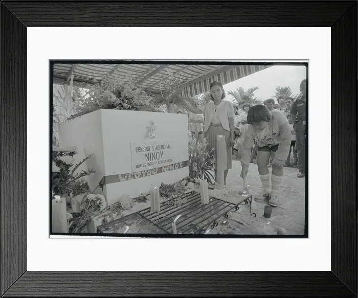 Framed Print : Children of Benigno Aquino Visiting His Grave Site Framed Print : Children of Benigno Aquino Visiting His Grave Site