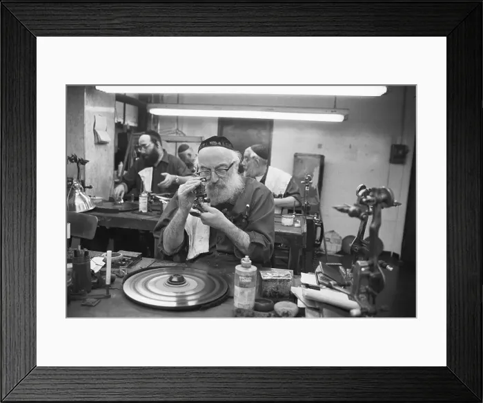 Framed Print : Diamond Cutter Examines Stone Framed Print : Diamond Cutter Examines Stone