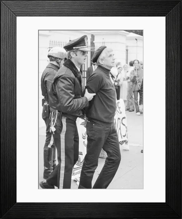 Framed Print : Policeman Arresting Daniel Berrigan