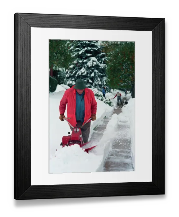Framed Print : Man Using Snowblower Framed Print : Man Using Snowblower