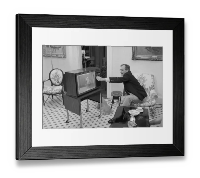 Framed Print : George Bush Adjusting a Television Framed Print : George Bush Adjusting a Television