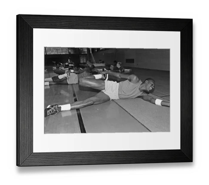 Framed Print : Michael Jordan Doing Stretching Exercises Framed Print : Michael Jordan Doing Stretching Exercises