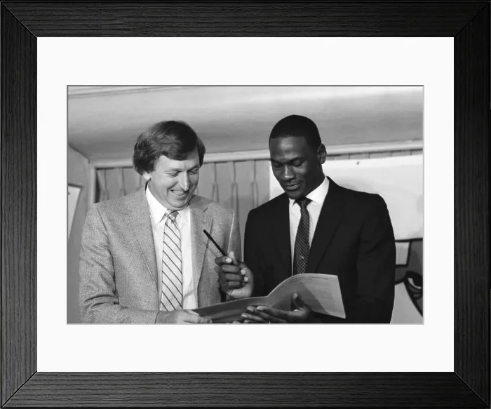 Framed Print : Michael Jordan Looking Over New Contract With Bulls Framed Print : Michael Jordan Looking Over New Contract With Bulls