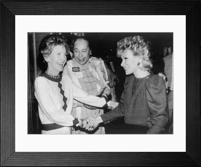 Framed Print : Nancy Reagan Shaking Hands with Joan Rivers Framed Print : Nancy Reagan Shaking Hands with Joan Rivers