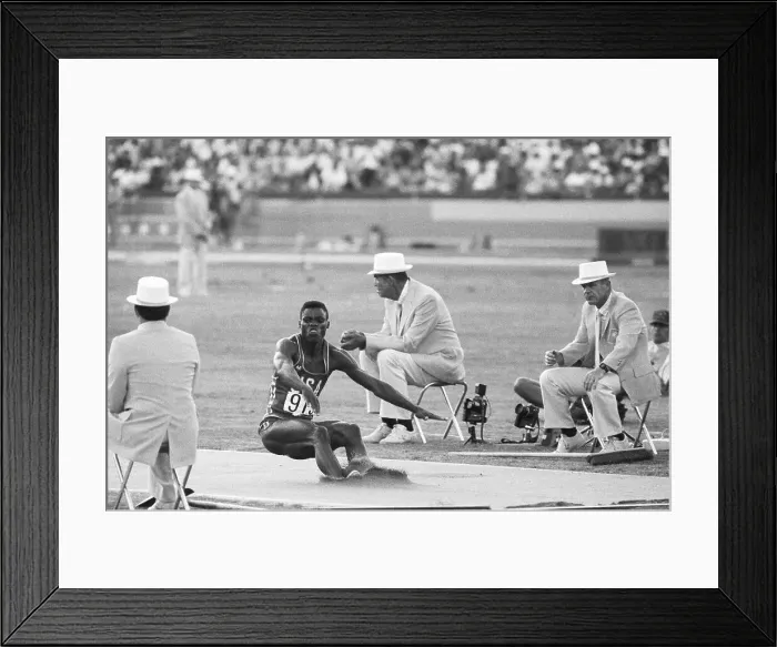 Framed Print : Lewis In The Long Jump At Olympics Framed Print : Lewis In The Long Jump At Olympics