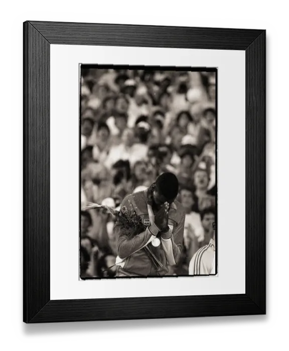 Framed Print : Carl Lewis Prays at Olympic Ceremony Framed Print : Carl Lewis Prays at Olympic Ceremony