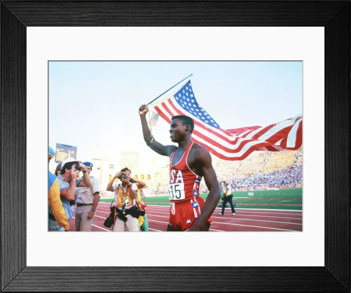 Framed Print : Carl Lewis Running with American Flag Framed Print : Carl Lewis Running with American Flag