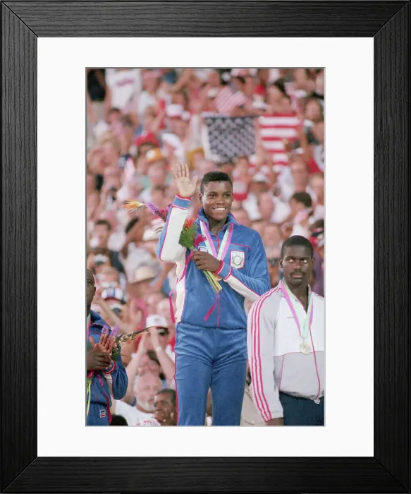 Framed Print : Carl Lewis Waving From Gold Medal Podium Framed Print : Carl Lewis Waving From Gold Medal Podium