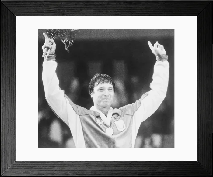 Framed Print : Jeff Blatnick Holding His arms up in Victory After Wrestling Event Framed Print : Jeff Blatnick Holding His arms up in Victory After Wrestling Event