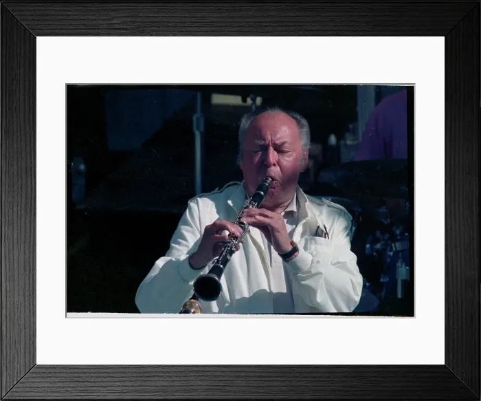 Framed Print : Band Leader Woody Herman Entertaining with Flute Framed Print : Band Leader Woody Herman Entertaining with Flute
