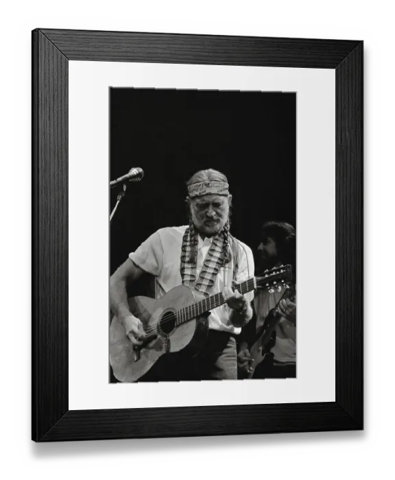 Framed Print : Willie Nelson Playing Guitar