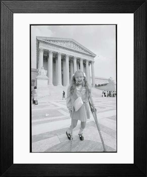 Framed Print : Girl on Crutches Outside of Supreme Court Framed Print : Girl on Crutches Outside of Supreme Court