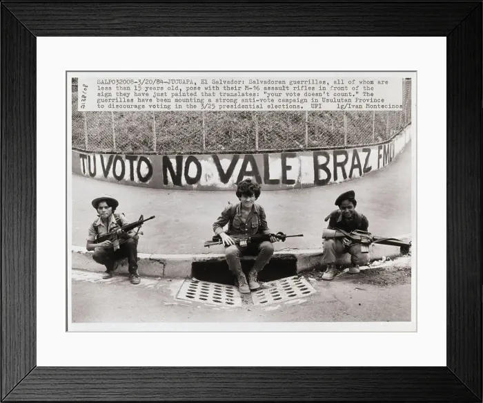 Framed Print : Salvadorean Guerrillas Pose with Anti-Vote Banner Framed Print : Salvadorean Guerrillas Pose with Anti-Vote Banner