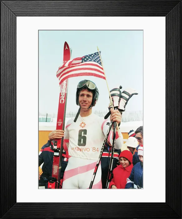 Framed Print : Downhill Racer Holding Flag Framed Print : Downhill Racer Holding Flag