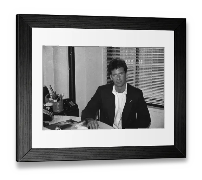 Framed Print : Calvin Klein Sitting at Desk Framed Print : Calvin Klein Sitting at Desk