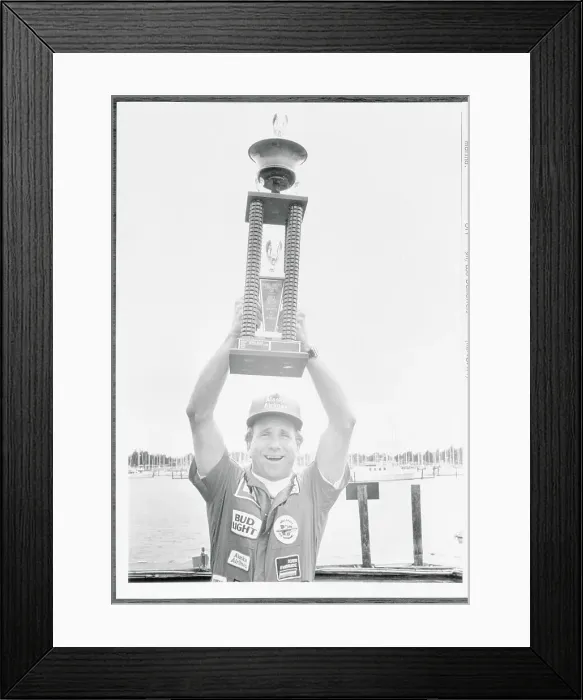 Framed Print : Mike Reagan Holding a Trophy Framed Print : Mike Reagan Holding a Trophy