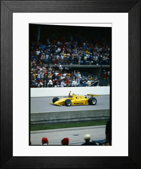 Framed Print : Rick Mears Driving and Raising Fist Framed Print : Rick Mears Driving and Raising Fist