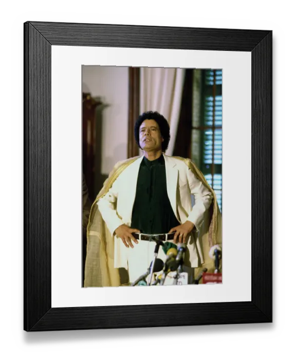 Framed Print : Libyan Leader Muammar Qaddafi Posing in Yellow Robe Framed Print : Libyan Leader Muammar Qaddafi Posing in Yellow Robe
