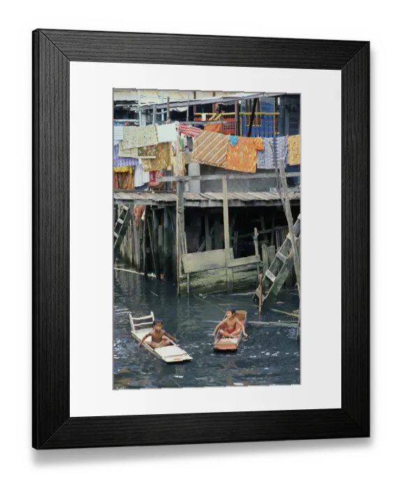 Framed Print : Young Citizens of Brunei Traveling in Boats Framed Print : Young Citizens of Brunei Traveling in Boats