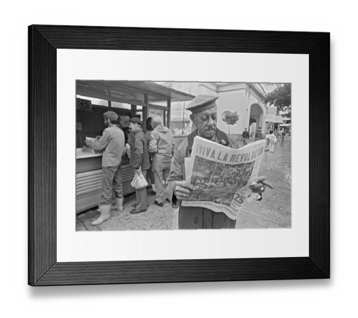 Framed Print : Cuban Man Reads Anniversary Newspaper Framed Print : Cuban Man Reads Anniversary Newspaper