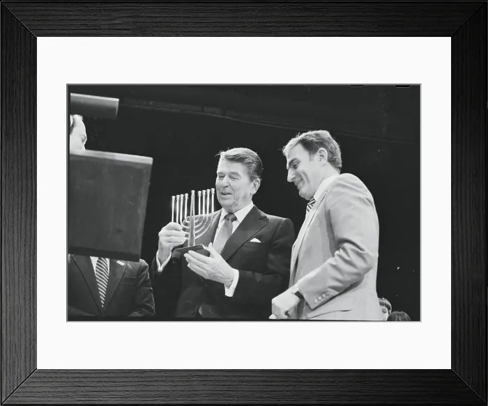 Framed Print : Ronald Reagan Holding a Menorah Framed Print : Ronald Reagan Holding a Menorah