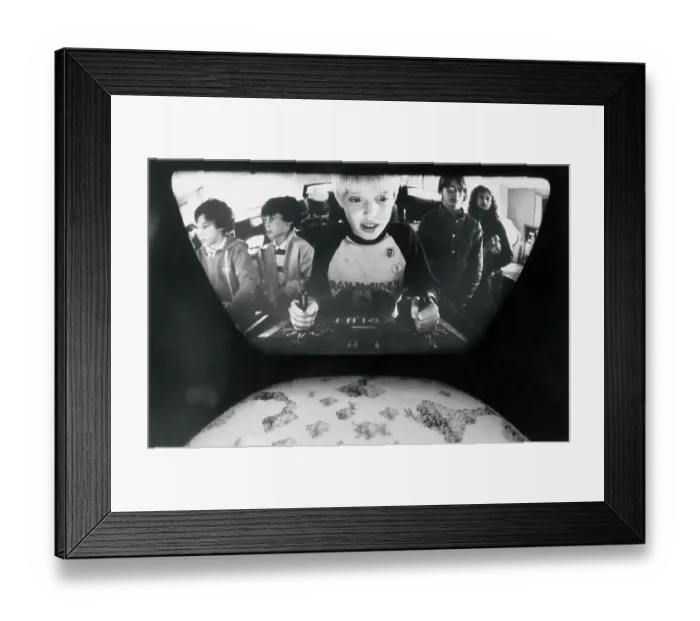 Framed Print : Boy Playing Video Game in Arcade Framed Print : Boy Playing Video Game in Arcade