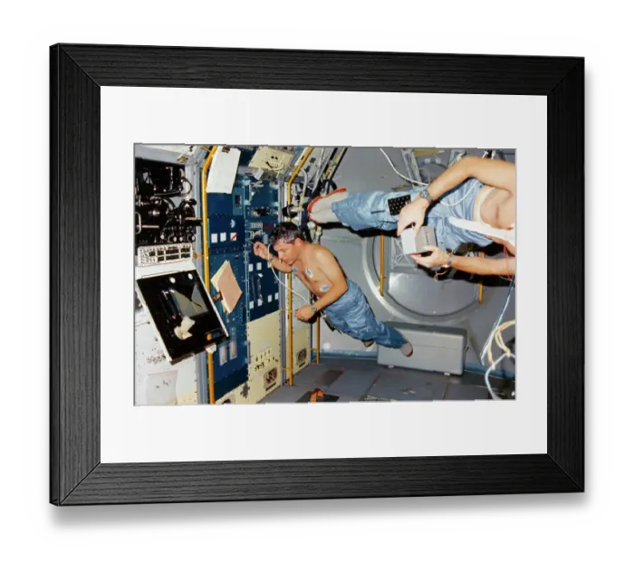Framed Print : Astronauts Operating Mechanism in Gravity Free Module Framed Print : Astronauts Operating Mechanism in Gravity Free Module