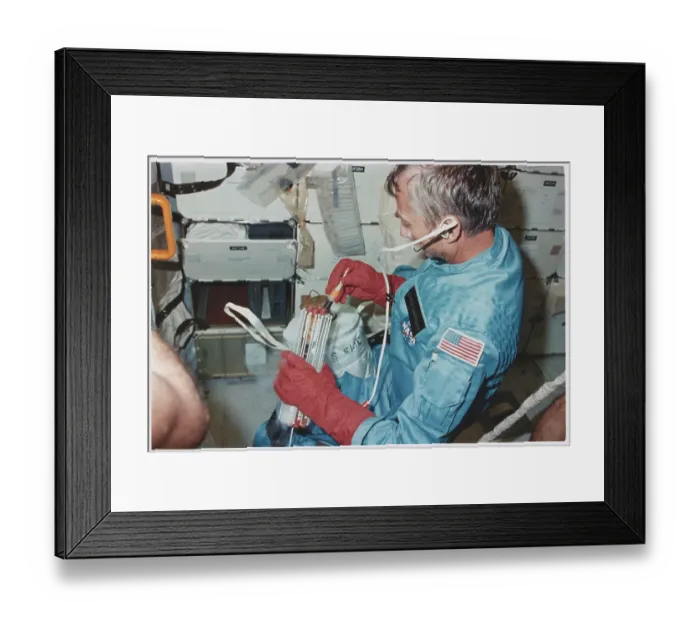 Framed Print : Astronaut Owen K. Garriott Working with Medical Specimens Framed Print : Astronaut Owen K. Garriott Working with Medical Specimens